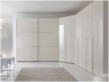 Ъглови шкафове в хола: видове, селекция и опции в интериора