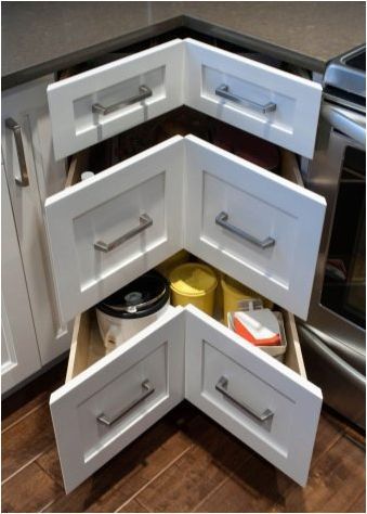 Ъглови шкафове в кухнята: разновидности, избор и примери
