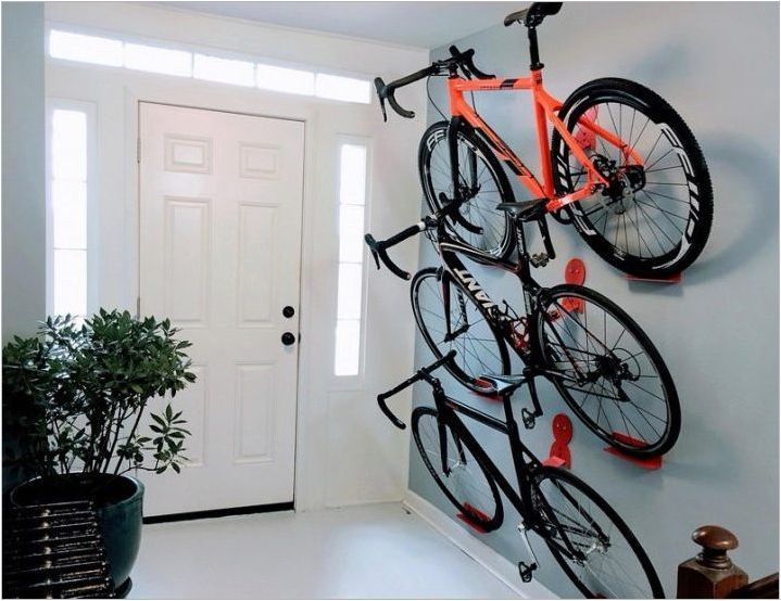 Закрепване за велосипед на стената: видове, съвети за избор и инсталиране