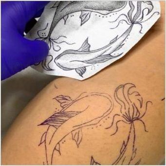Как да превеждате татуировка на тялото с хартия?