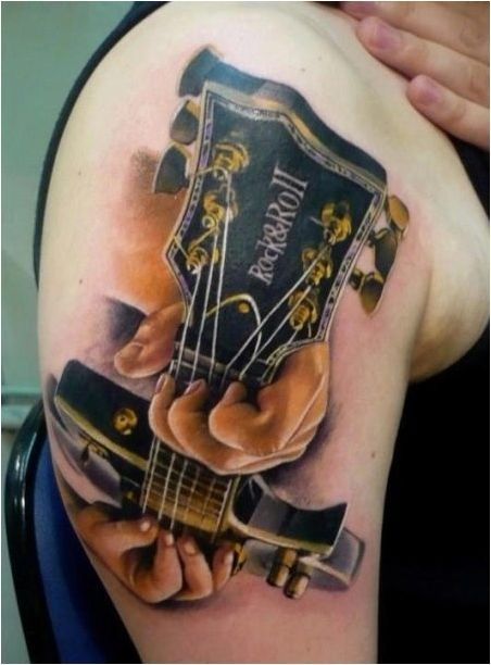 Стойността и скиците на татуировката под формата на китара